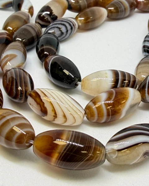 Striped (dyed) Agate Rice Beads Approx 8 x 16mm 38cm Strand